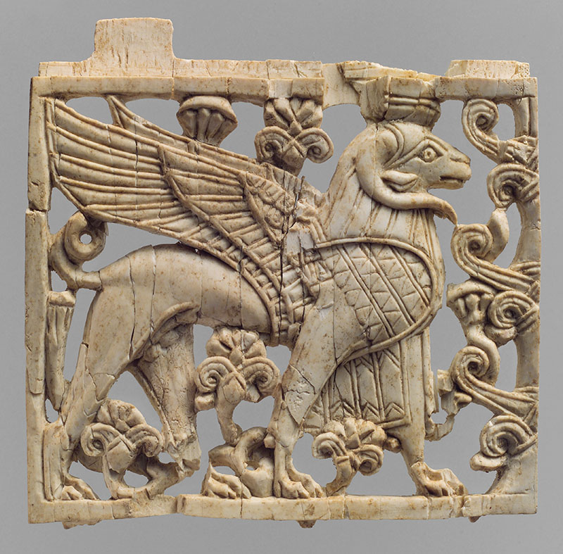 Openwork furniture plaque with a striding ram-headed sphinx